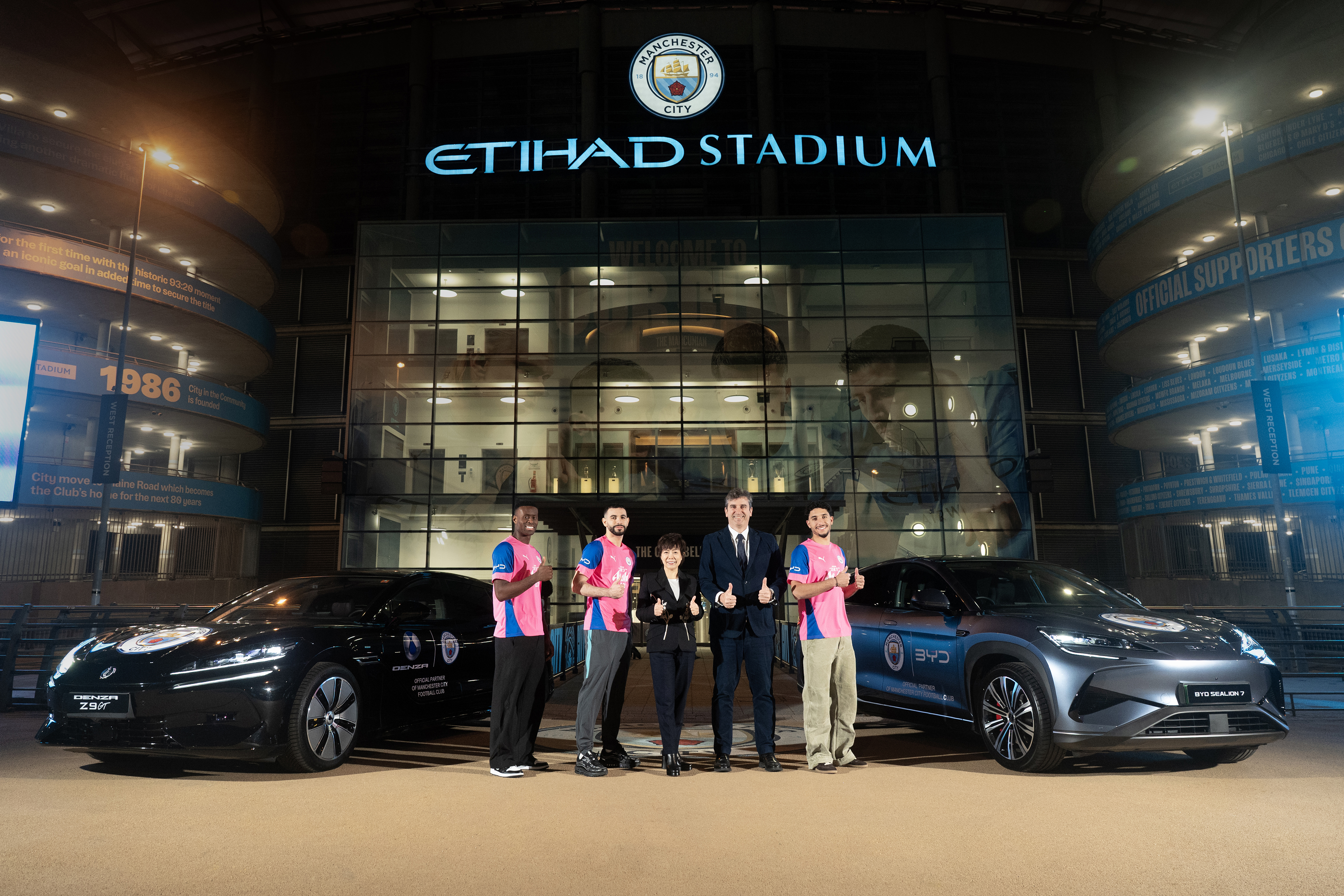 Manchester City players Marc Guéhi, Rayan Aït-Nouri and Omar Marmoush with Stella Li and Ferran Soriano